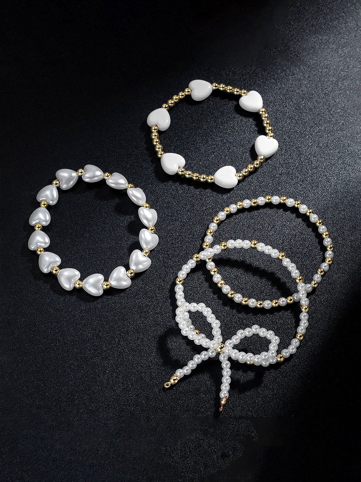 4 Pieces Heart Shaped Imitation Pearl Bow Beaded Bracelets Set