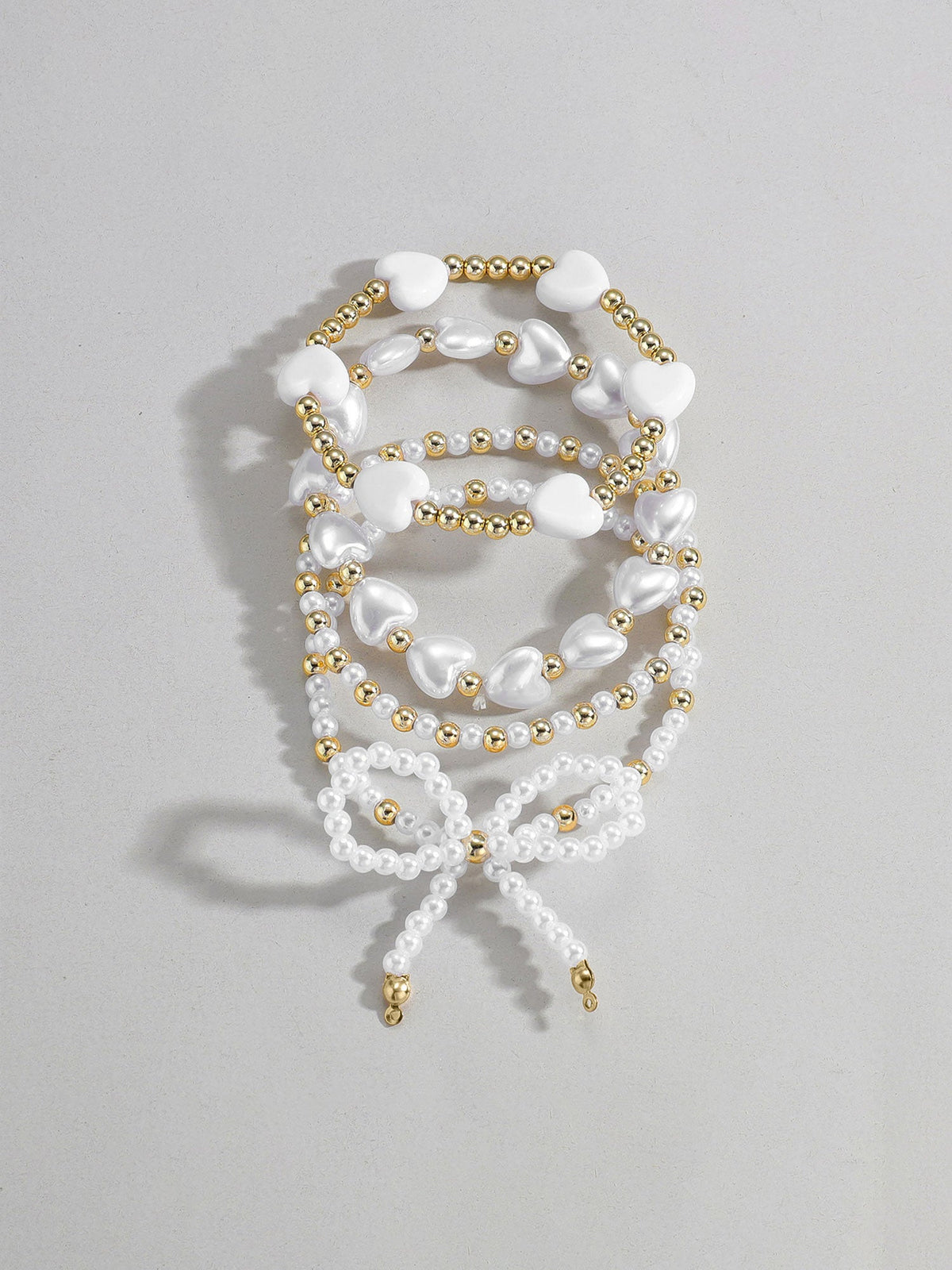 4 Pieces Heart Shaped Imitation Pearl Bow Beaded Bracelets Set